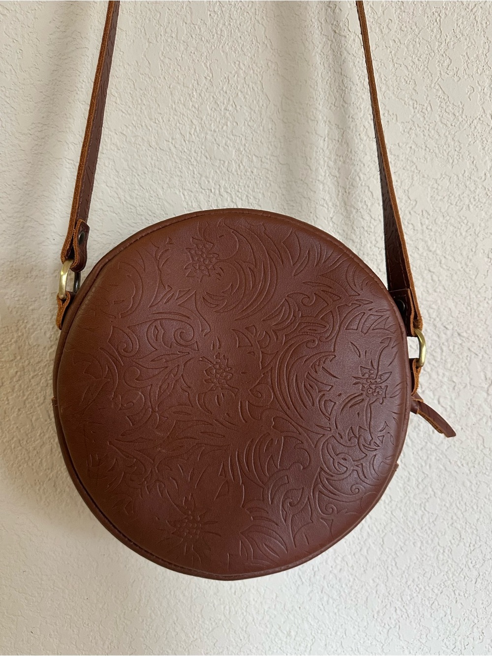 Portland Leather Goods Large Circle Crossbody Floral Embossed Leather Bag Cognac